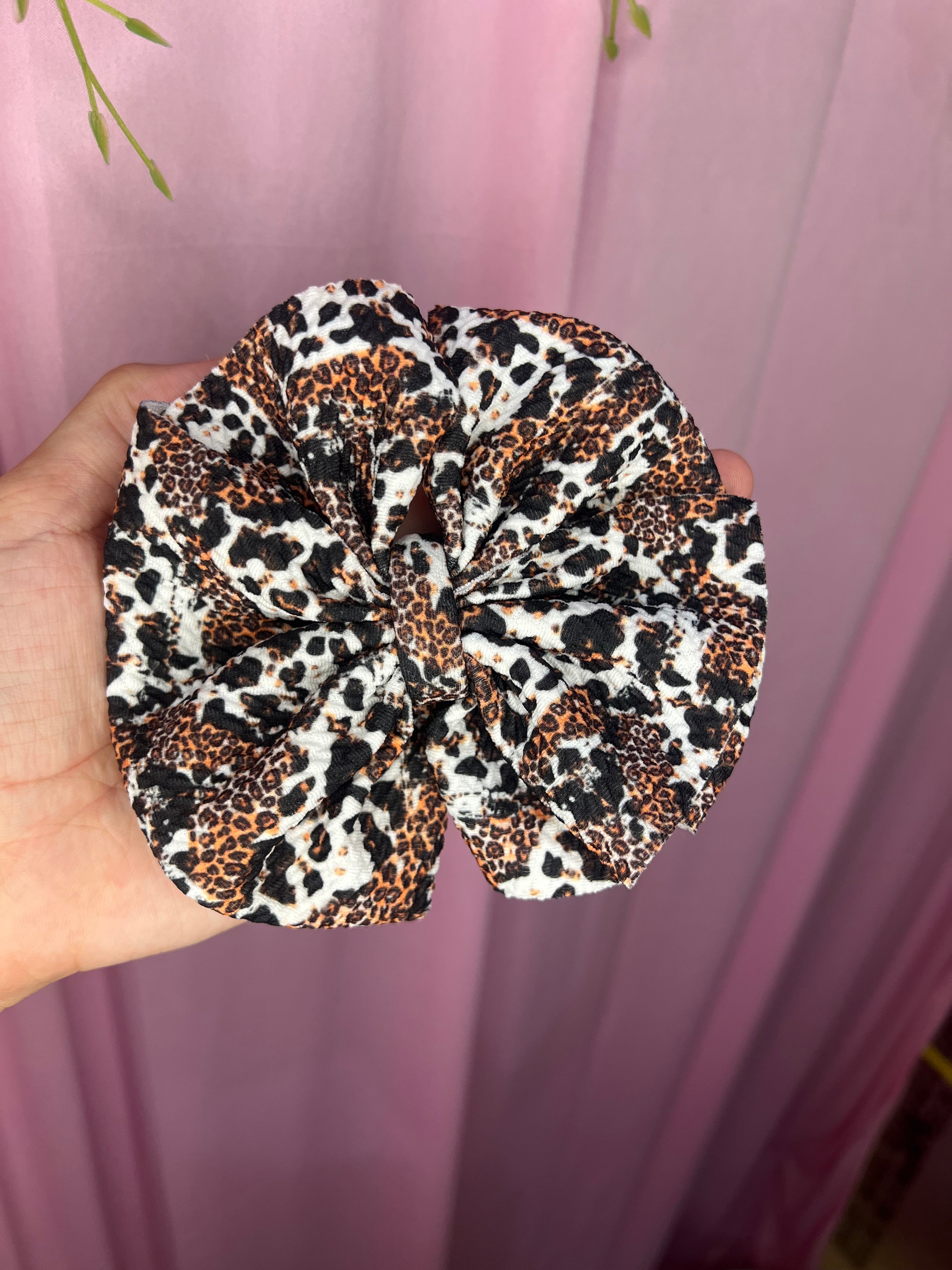 Cow cheetah bow