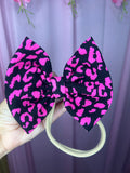 Pink cheetah bow