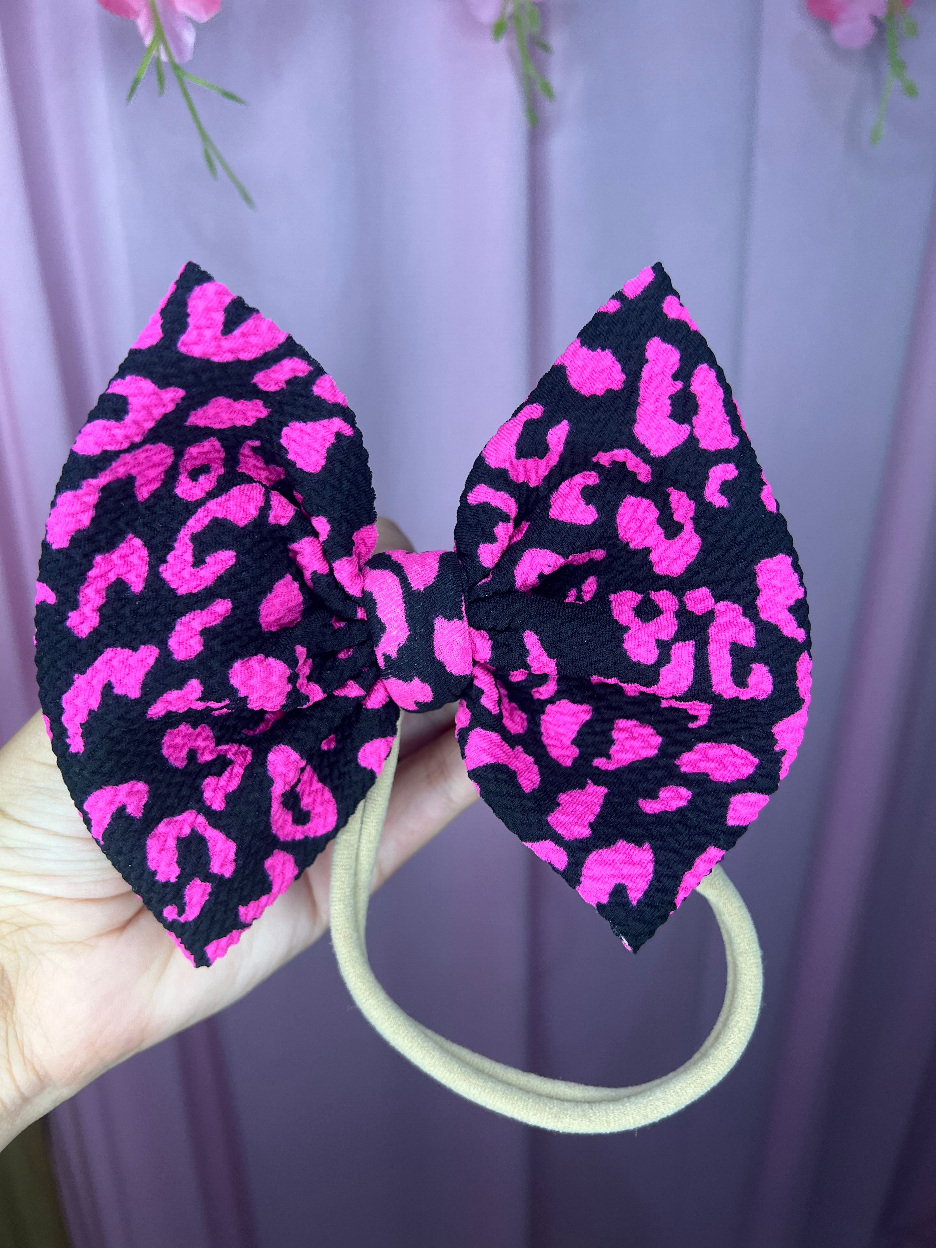 Pink cheetah bow