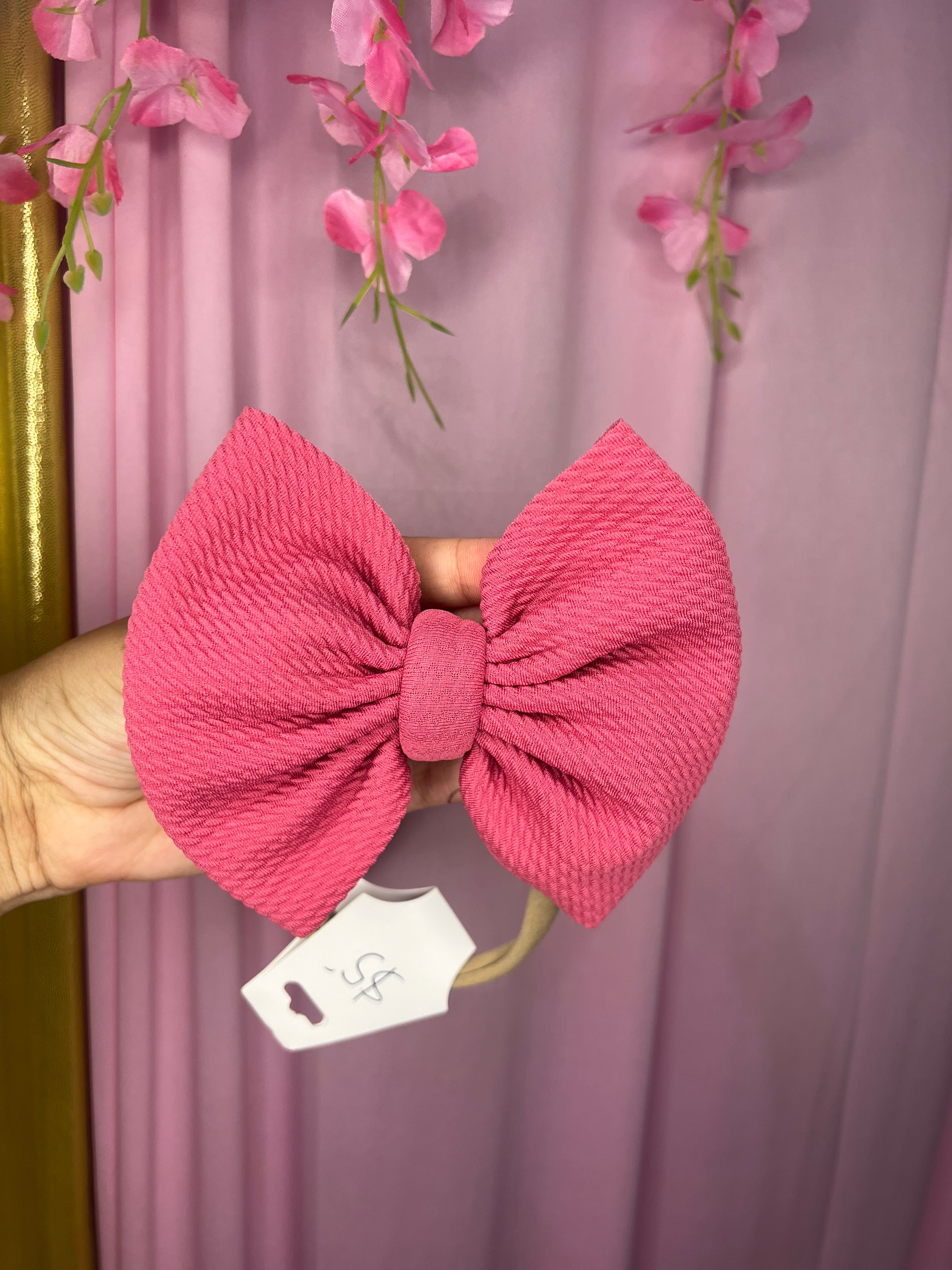 Mauve pink bow