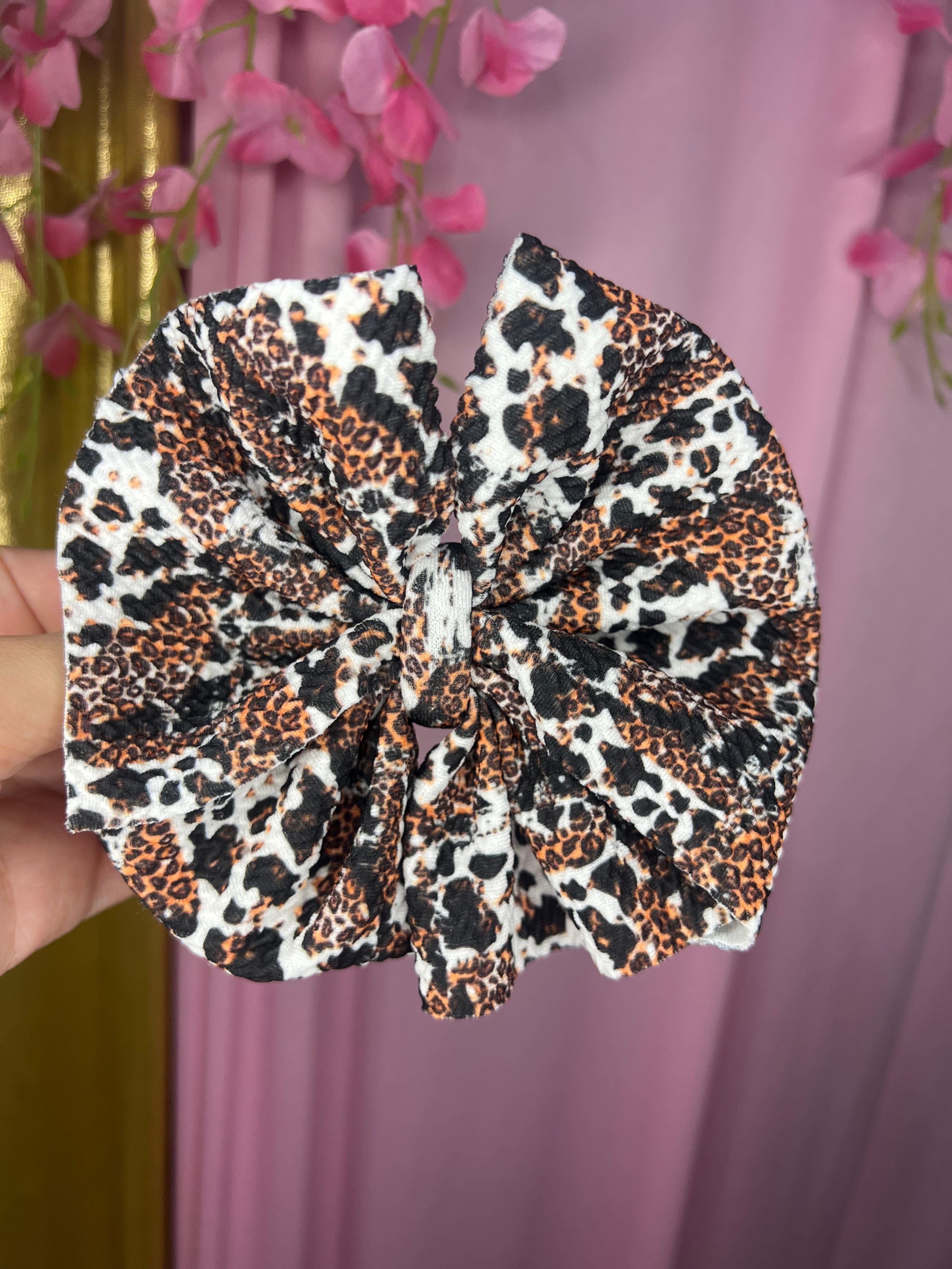 Cowprint pinwheel bow