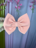 Salmon pink bow